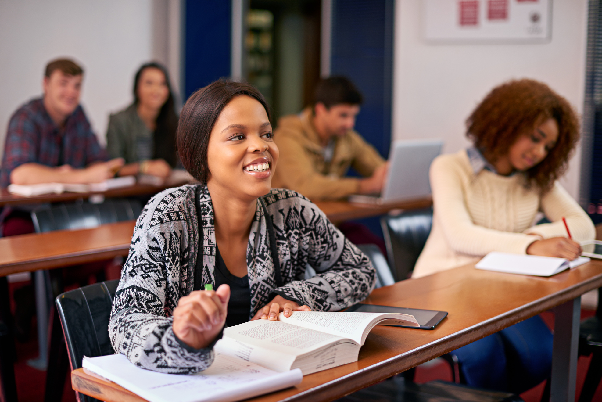 Furthering Their Education. Shot of a Happy Student Paying Atten